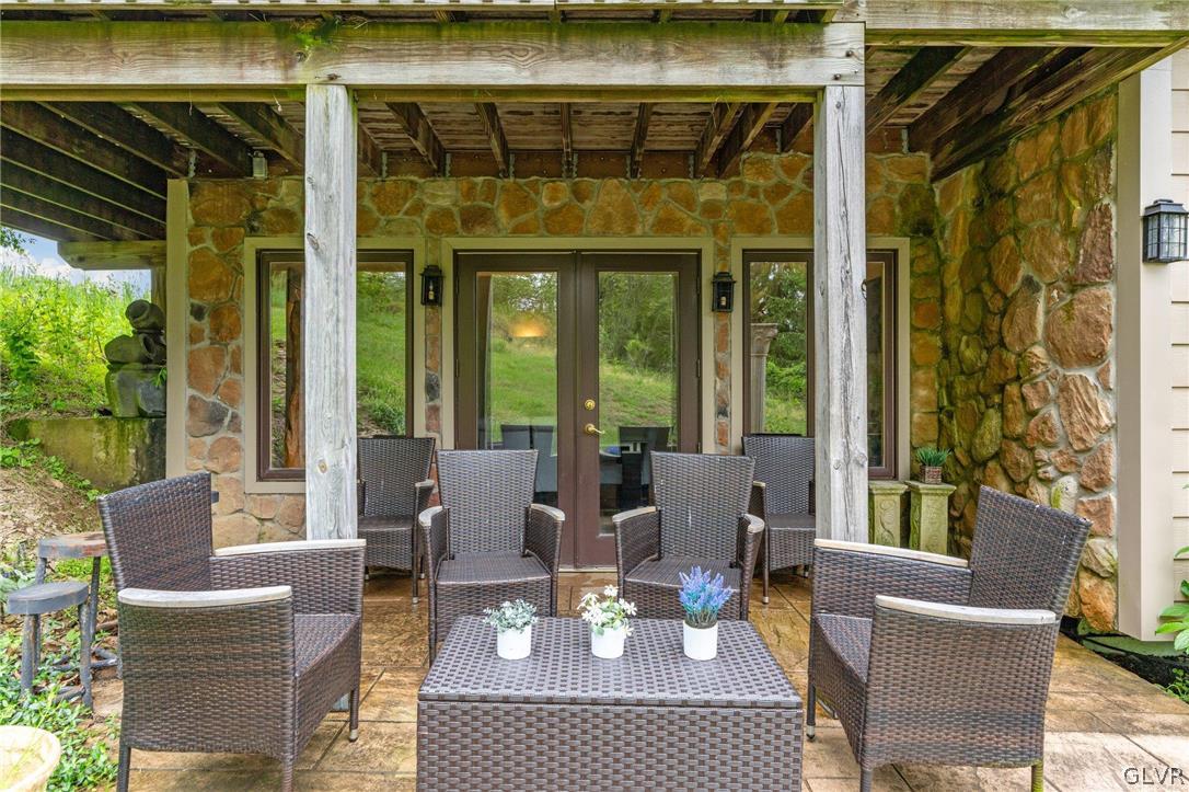 9325 Danner Road New Tripoli, PA 18066 - Photo 42 of 50 a view of a patio with couches chairs and potted plants