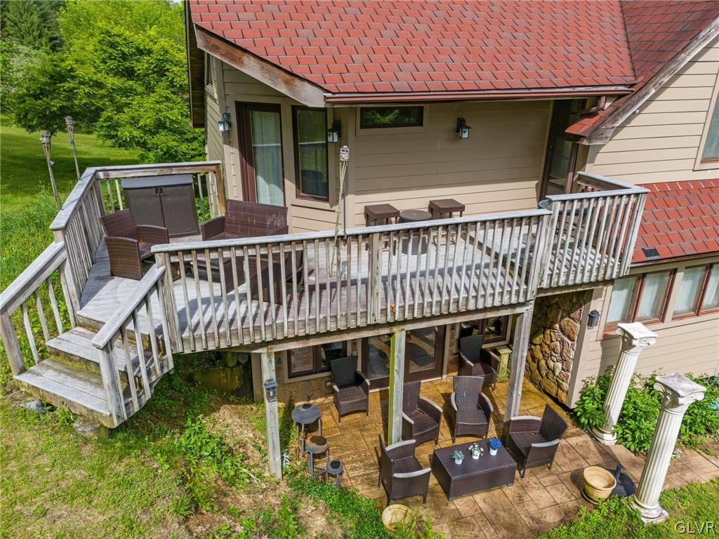 9325 Danner Road New Tripoli, PA 18066 - Photo 43 of 50 an outdoor space with furniture and umbrella