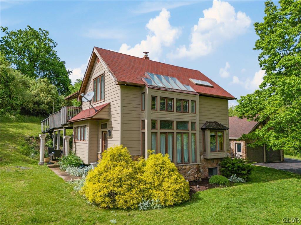 9325 Danner Road New Tripoli, PA 18066 - Photo 50 of 50 a front view of a house with a yard