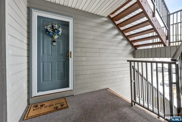 a view of a door and a window