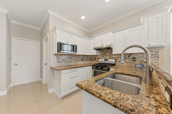 $579,000 | 113 Canterbury Place, Royal Palm Beach, FL 33414