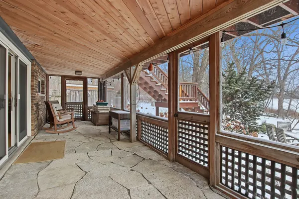 a view of a porch with furniture