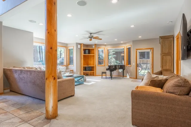 a view of a house with a snow on the road