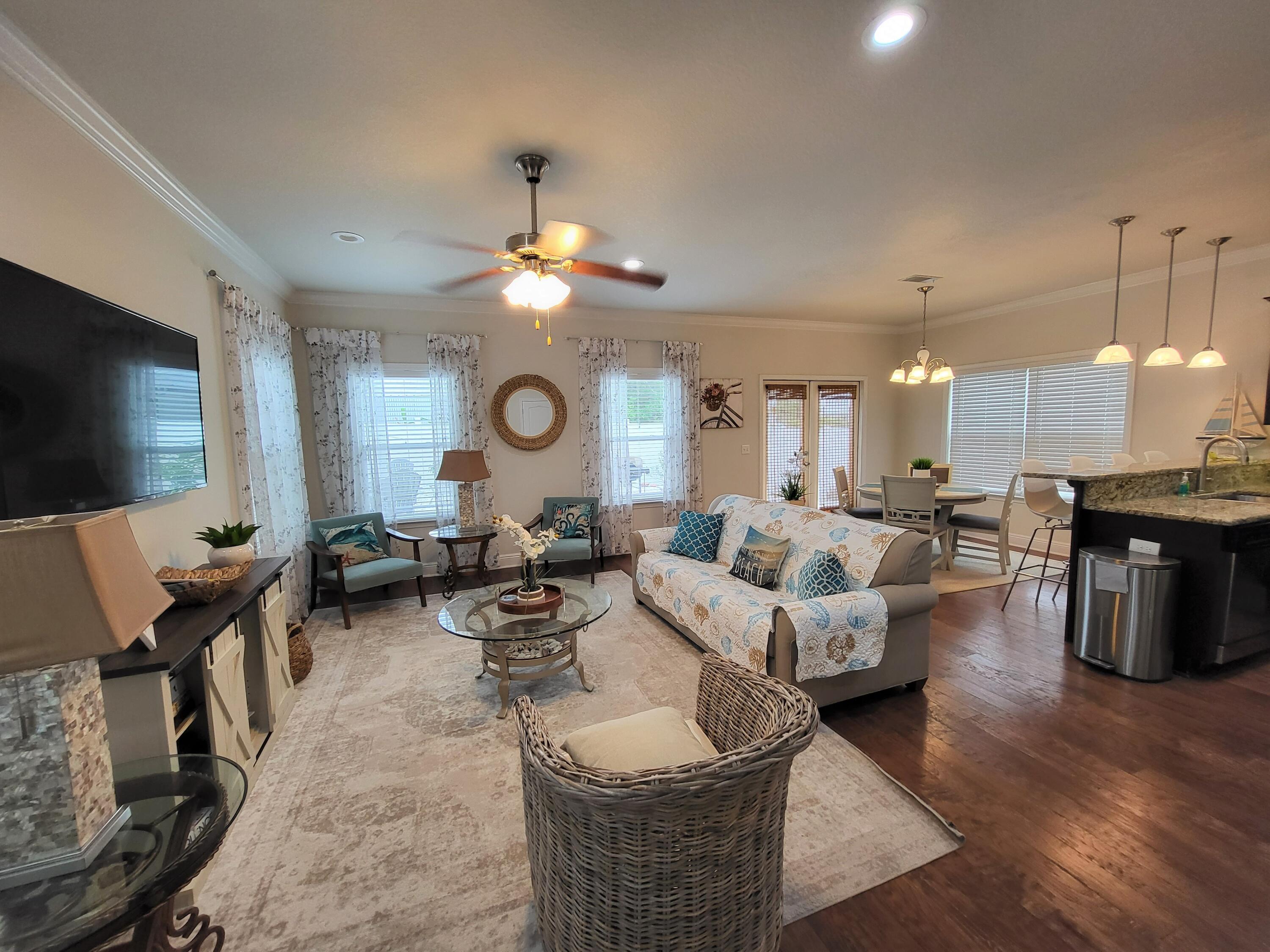 27 Topside Drive Inlet Beach, FL 32461 - Photo 15 of 33 a living room with lots of furniture and kitchen view