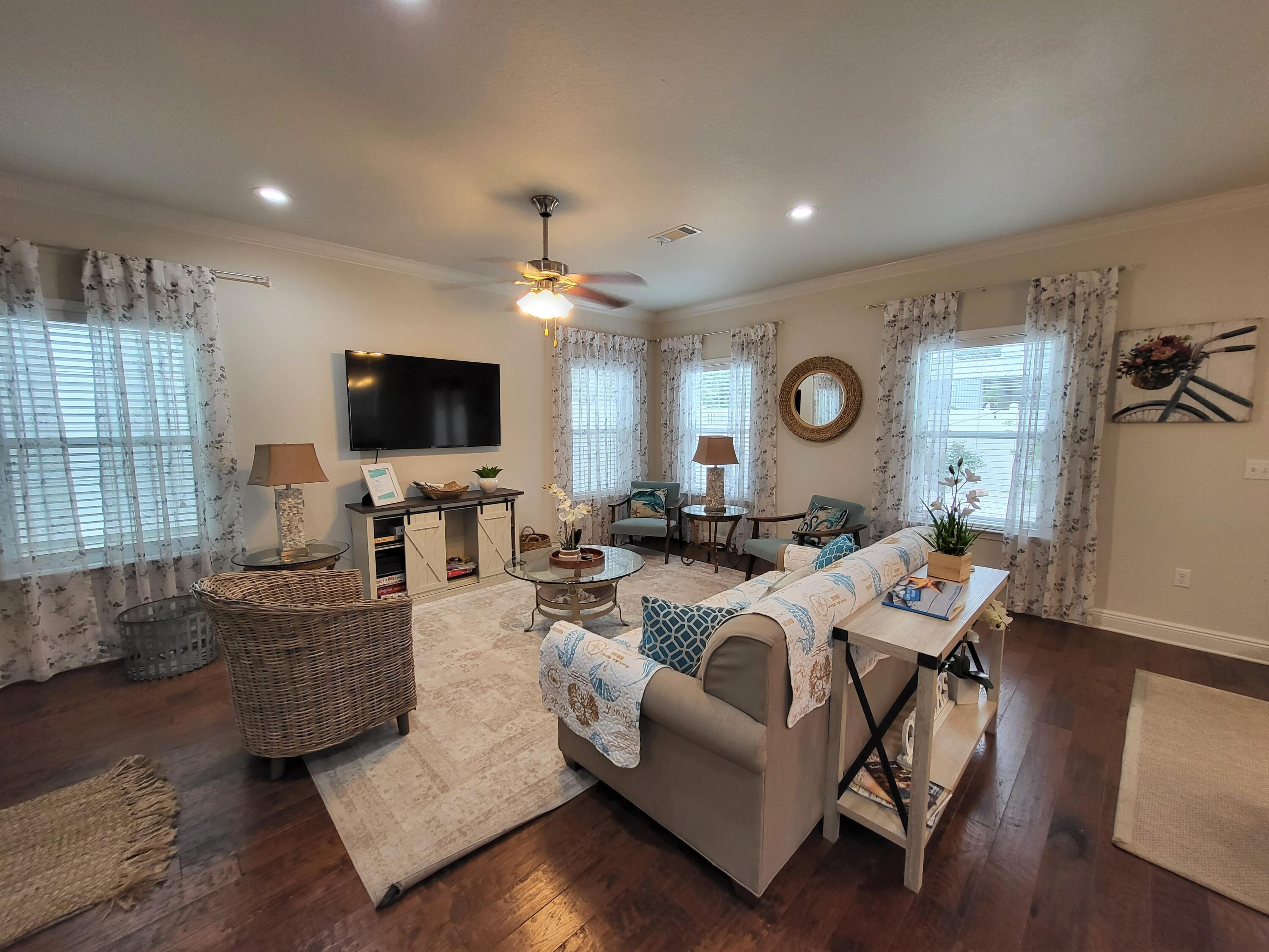 27 Topside Drive Inlet Beach, FL 32461 - Photo 16 of 33 a living room with furniture and a flat screen tv