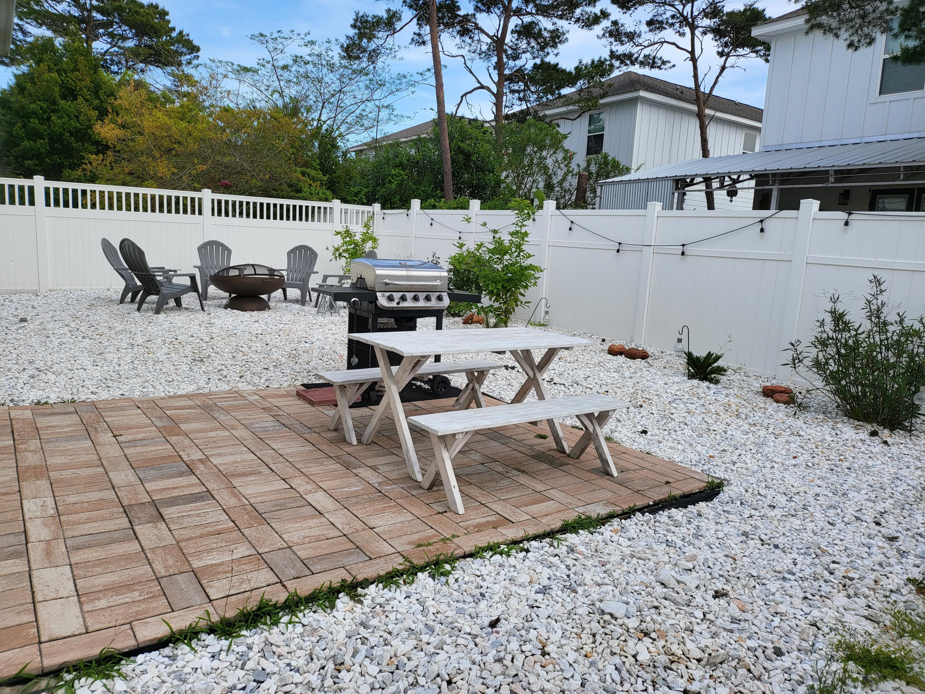 27 Topside Drive Inlet Beach, FL 32461 - Photo 3 of 33 a view of backyard with sitting area