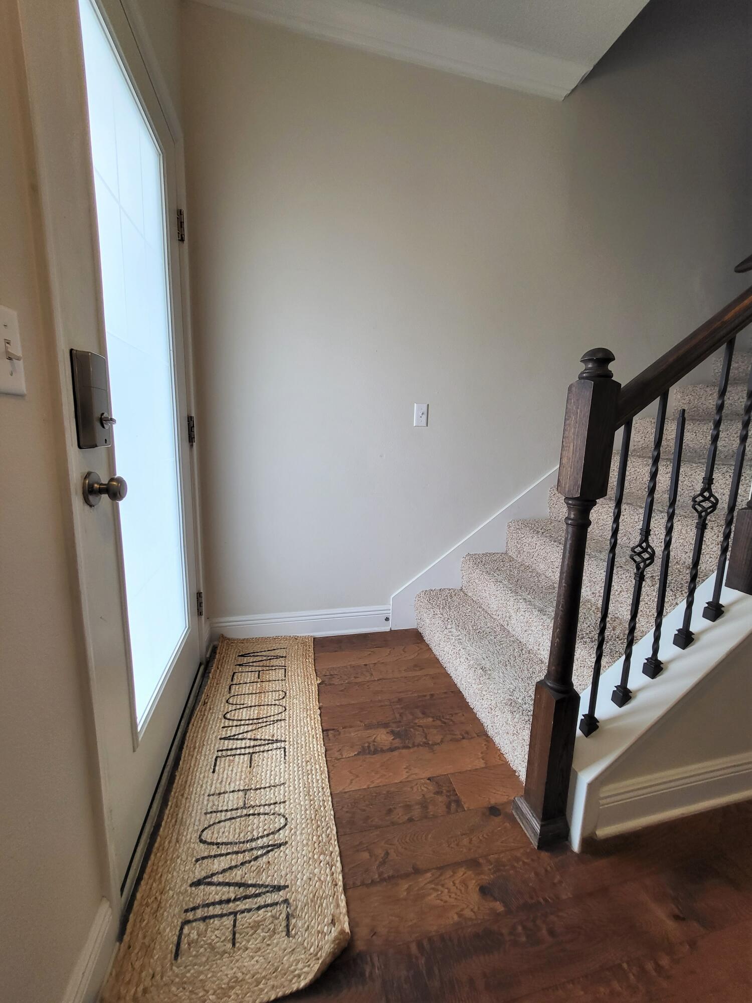 27 Topside Drive Inlet Beach, FL 32461 - Photo 6 of 33 wooden floor with staircase and door