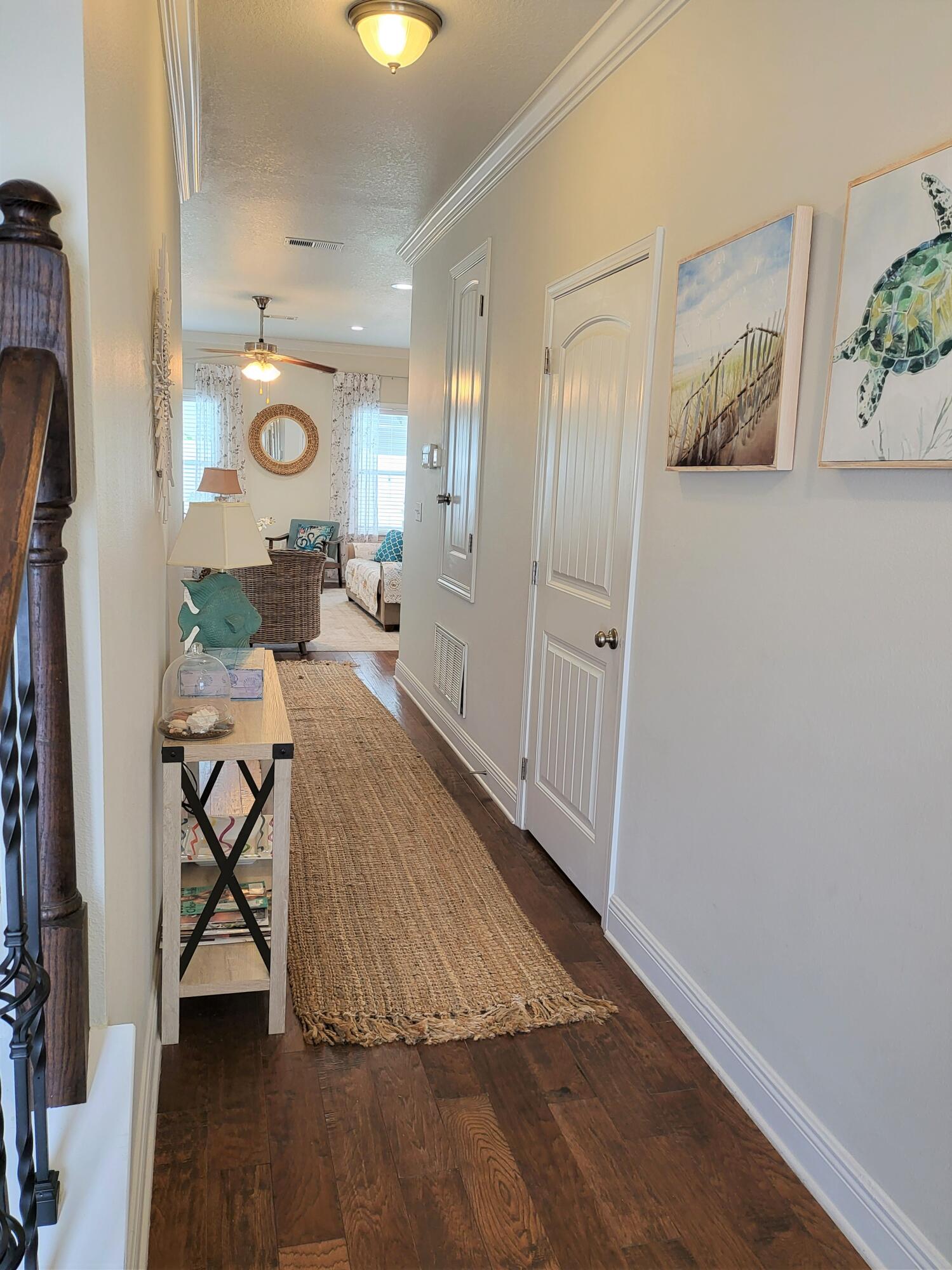 27 Topside Drive Inlet Beach, FL 32461 - Photo 7 of 33 a view of a hallway to a livingroom and furniture