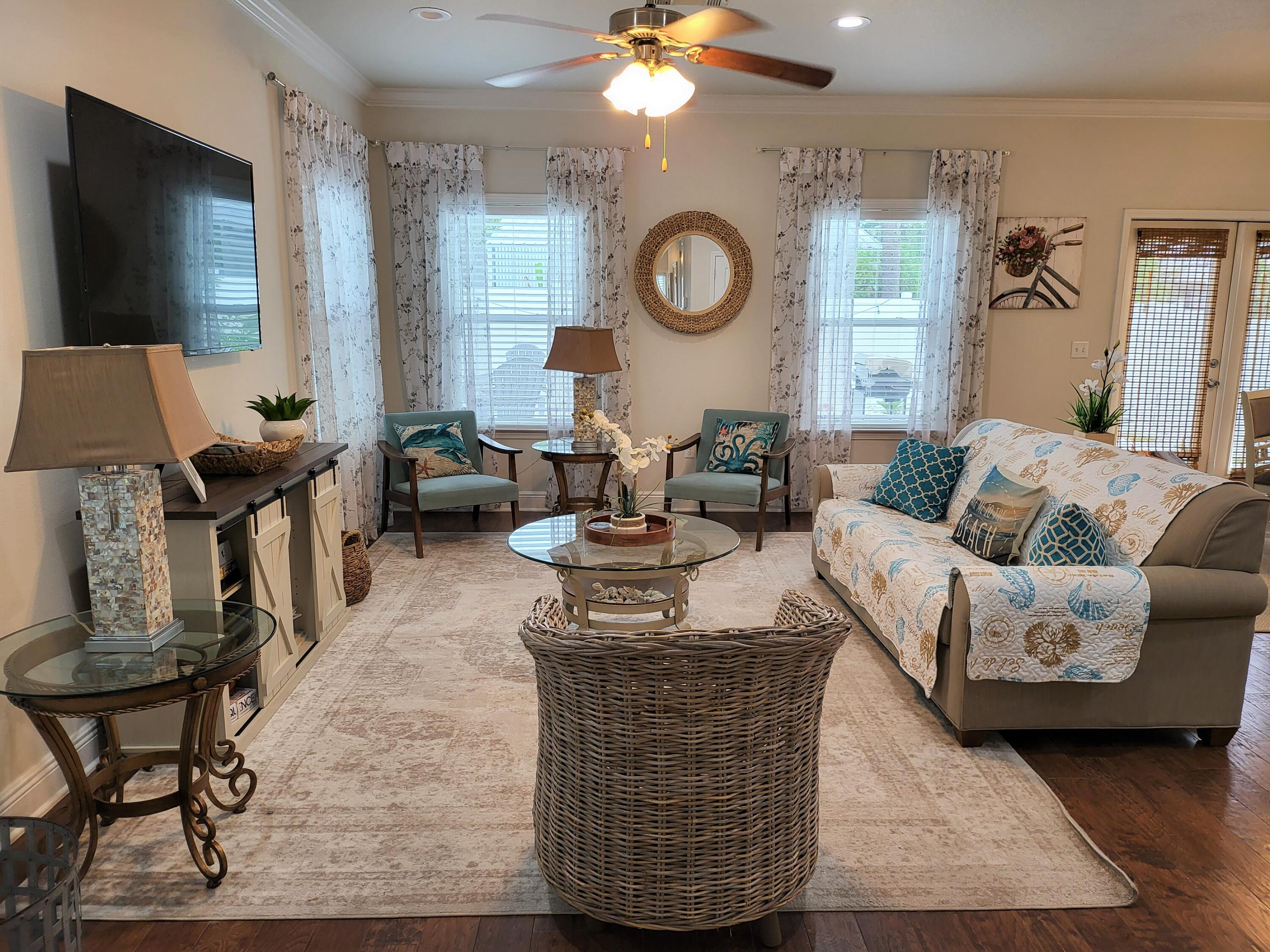 27 Topside Drive Inlet Beach, FL 32461 - Photo 8 of 33 a living room with furniture and a large window