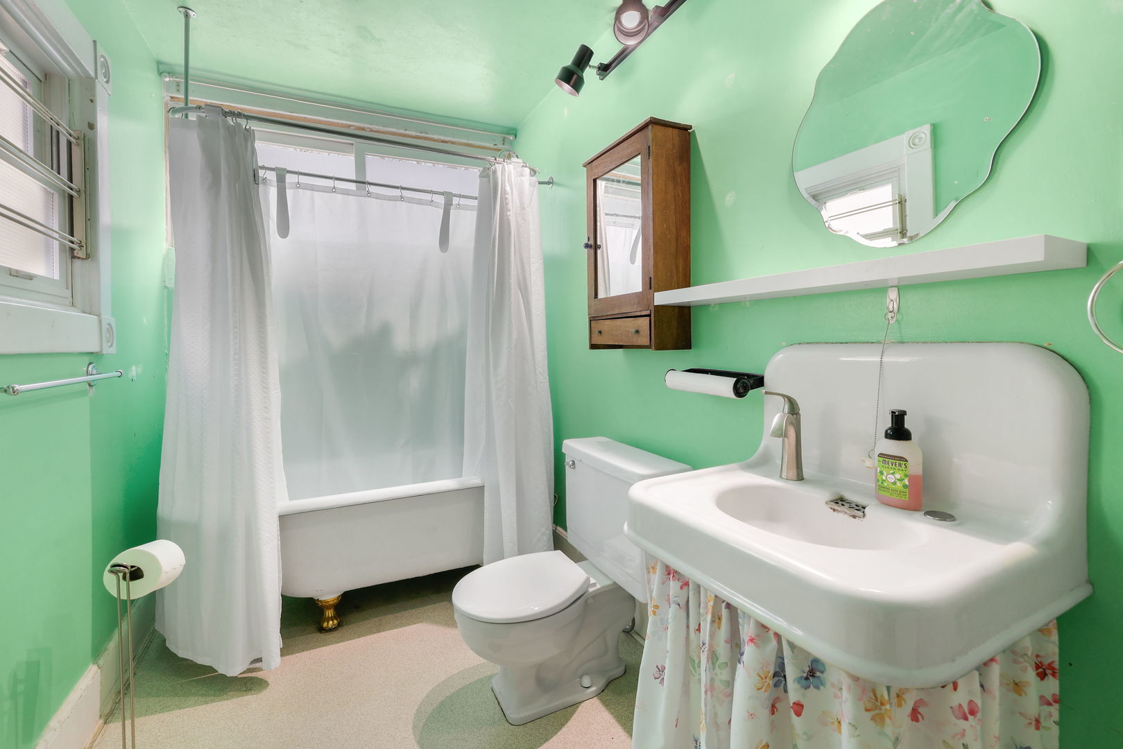 217 Henry Street Elgin, IL 60120 - Photo 9 of 17 a bathroom with a sink toilet and shower