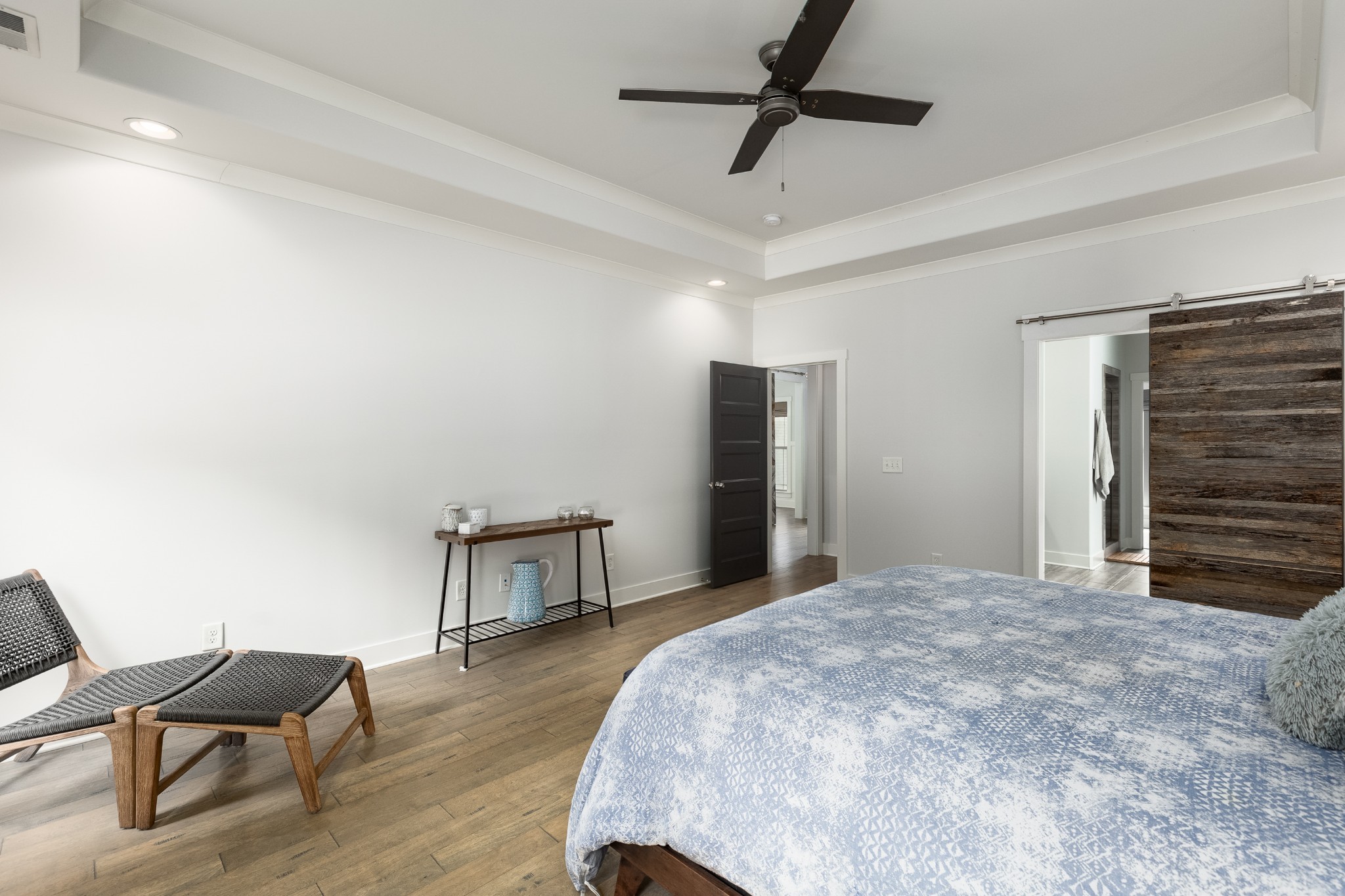 7970 Richpine Drive Murfreesboro, TN 37128 - Photo 12 of 30 a bedroom with a bed closet and a chair