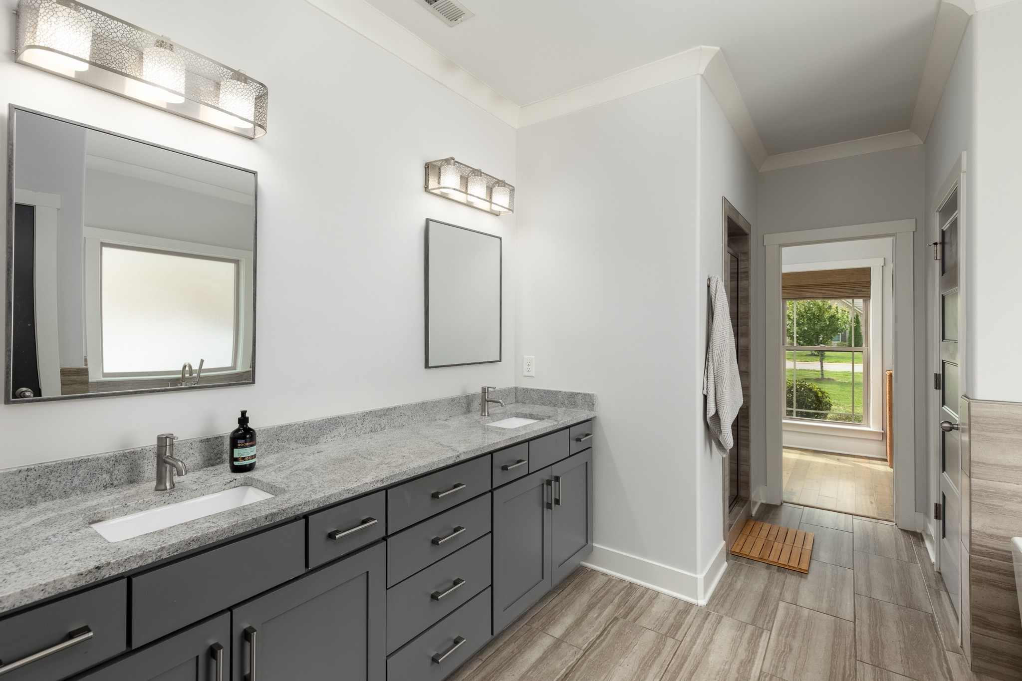 7970 Richpine Drive Murfreesboro, TN 37128 - Photo 14 of 30 a en suite bathroom with a granite countertop sink and a mirror