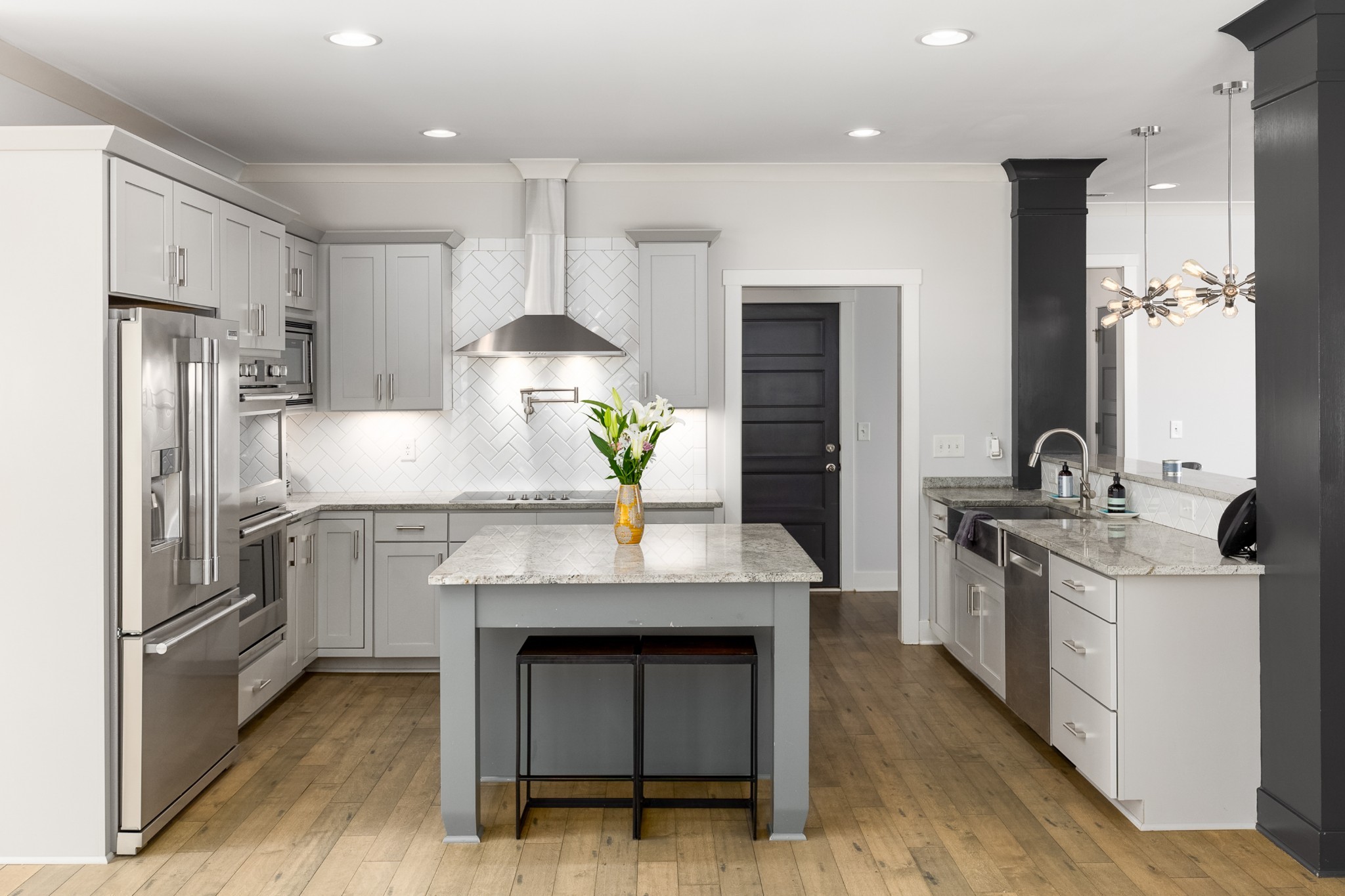 7970 Richpine Drive Murfreesboro, TN 37128 - Photo 5 of 30 a kitchen with granite countertop a sink stove and refrigerator