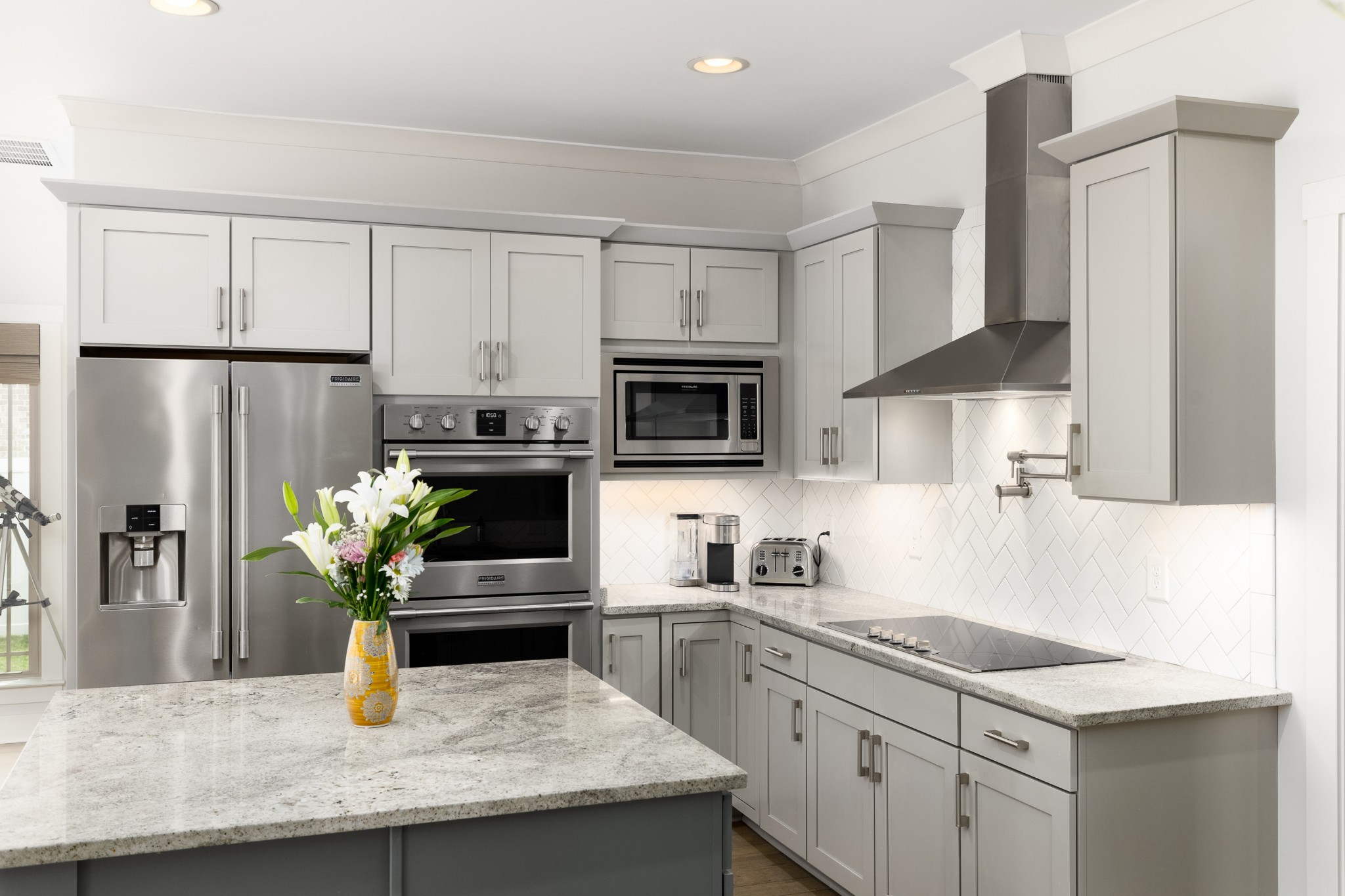 7970 Richpine Drive Murfreesboro, TN 37128 - Photo 6 of 30 a kitchen with stainless steel appliances granite countertop a sink a stove and a refrigerator