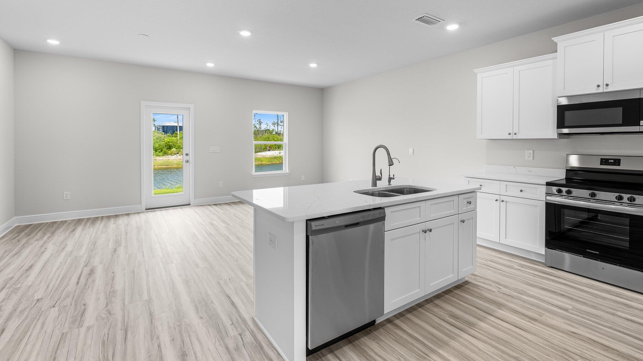 45 Hatton Court Santa Rosa Beach, FL 32459 - Photo 5 of 14 a kitchen with a sink stove and cabinets
