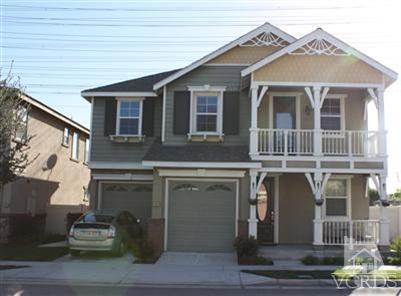 a front view of a house with entertaining space