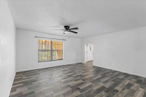 a kitchen with sink and window