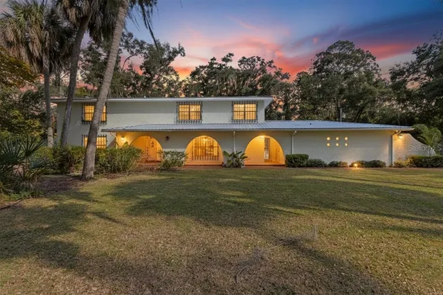 a view of a swimming pool with an outdoor space