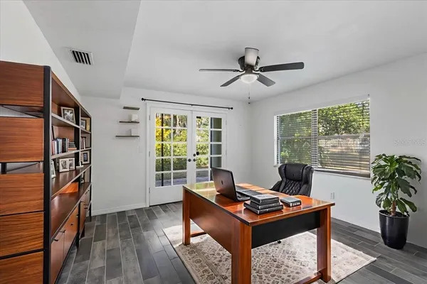a view of an empty room with a window