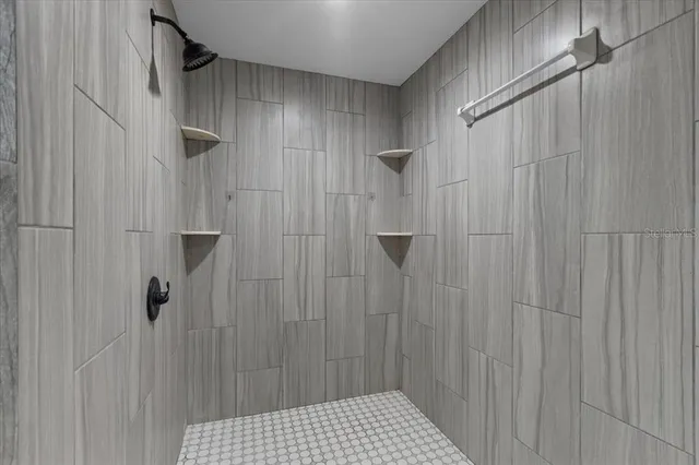 an aerial view of residential house with parking space