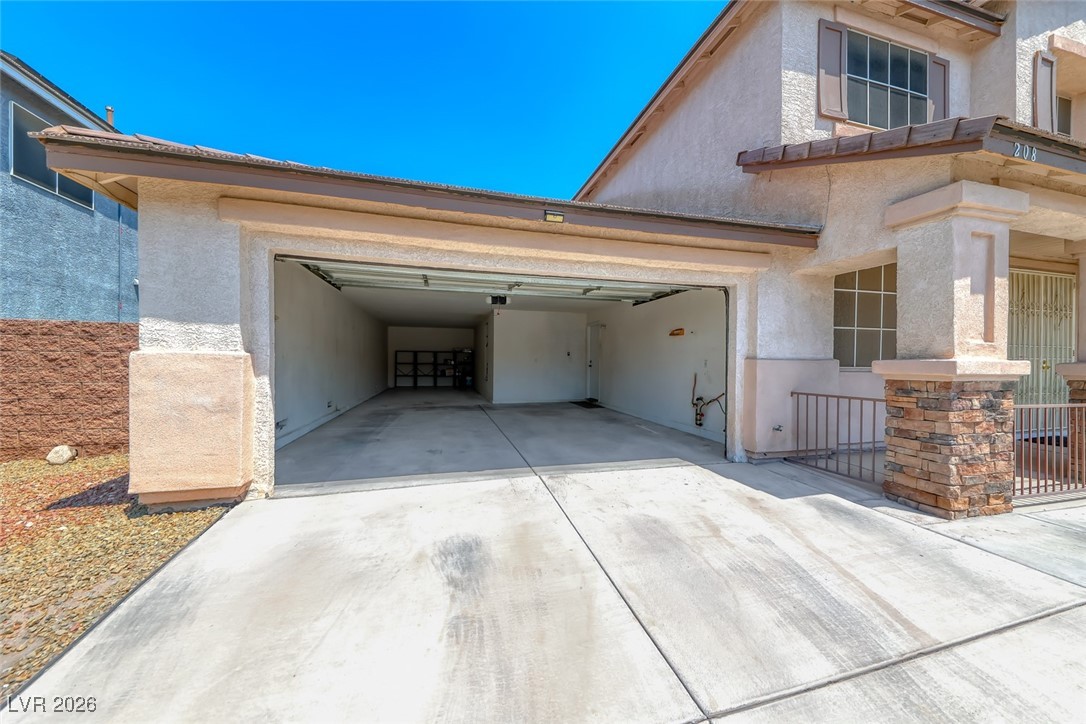 208 Glendon Street Henderson, NV 89074 - Photo 3 of 41 Tandem Garage, one of the few in the neighborhood that has one.