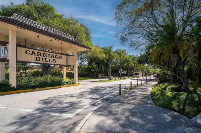 a sign board with yard in front of it