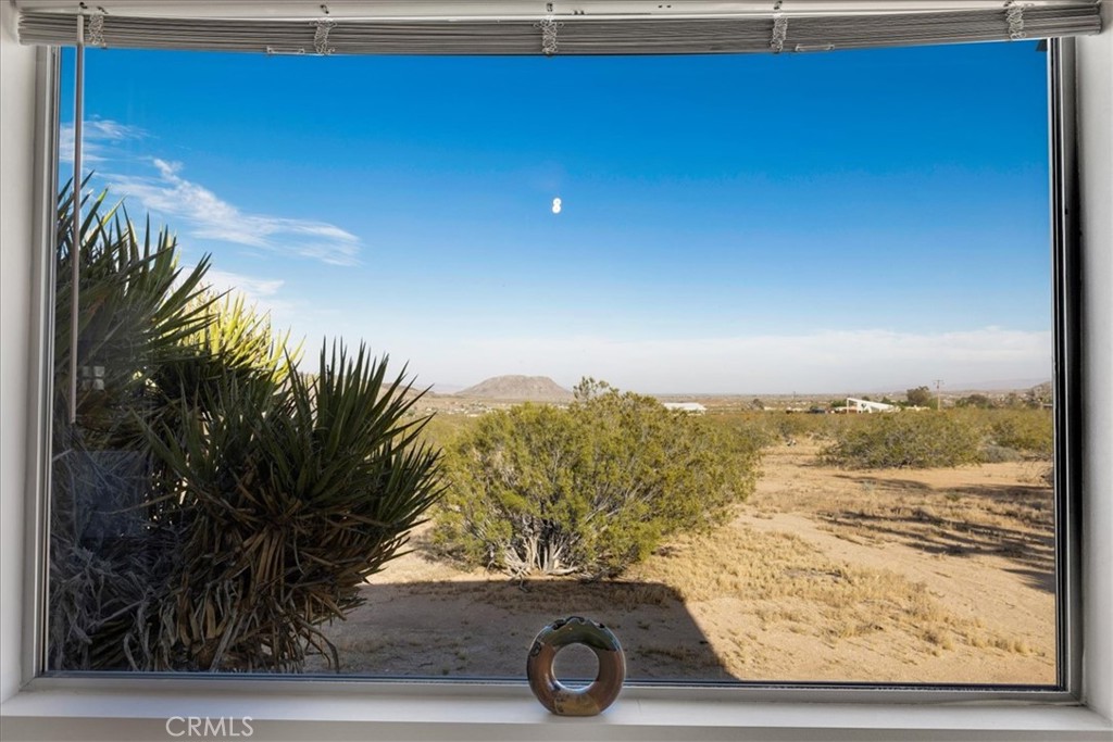 2625 Geronimo Trail Yucca Valley, CA 92285 - Photo 17 of 57 a view of sky from window