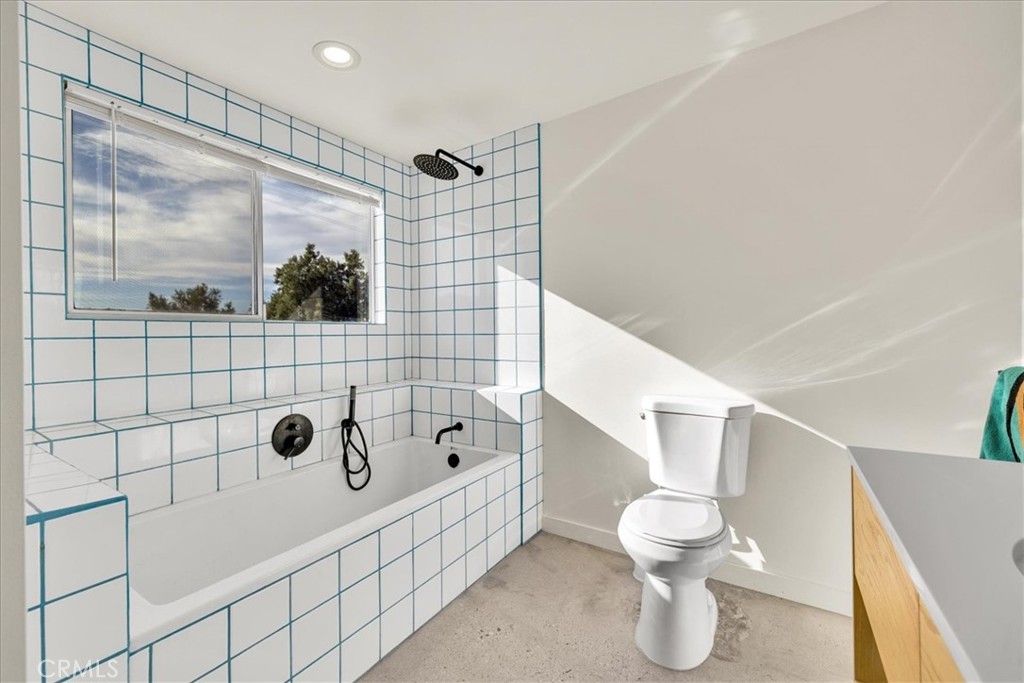 2625 Geronimo Trail Yucca Valley, CA 92285 - Photo 22 of 57 a bathroom with a toilet and shower