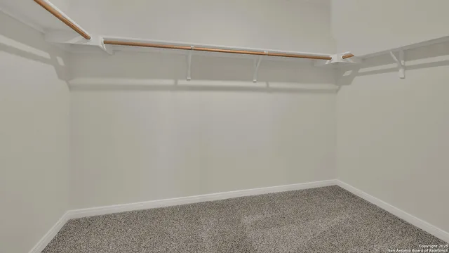 a bathroom with a toilet and a bathtub