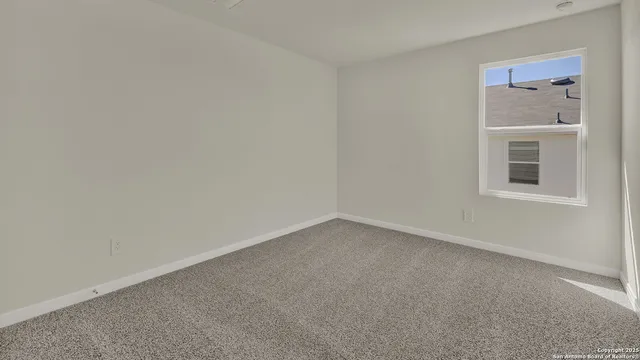 a view of a house with backyard and deck