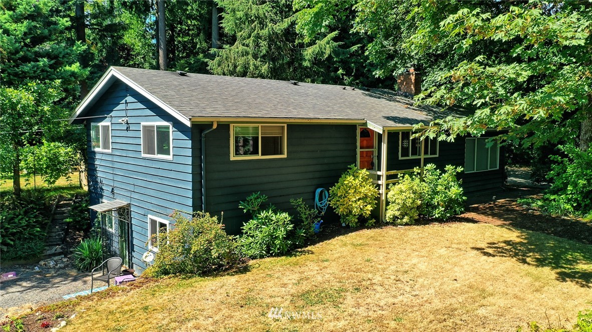 23816 2nd Avenue Southeast Bothell, WA 98021 - Photo 3 of 35 a view of a house with a yard
