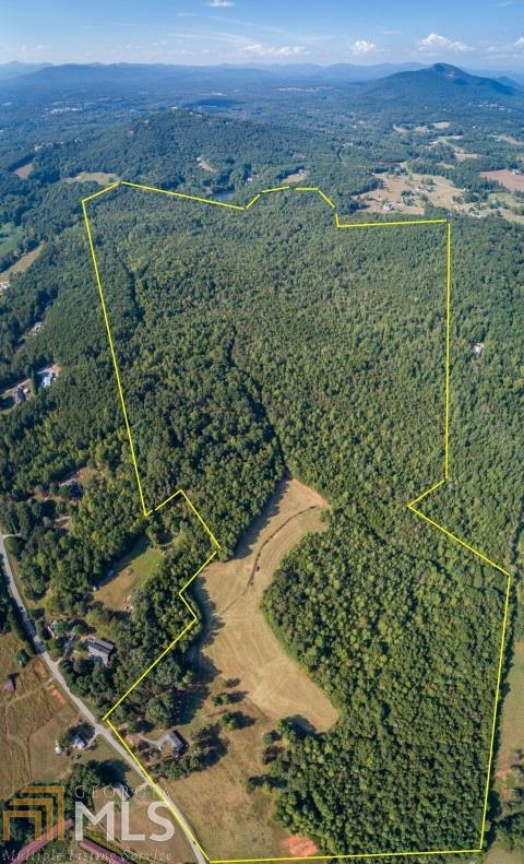 991 Post Road Cleveland, GA 30528 - Photo 1 of 1 a view of a green field with an outdoor space