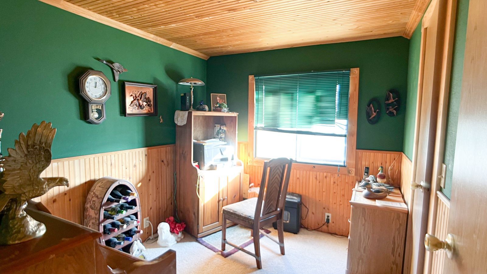 394 Spring Valley Parkway Spring Creek, NV 89815 - Photo 10 of 21 a room with furniture and a window