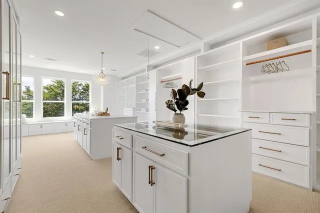 a bathroom with a large window and a large window