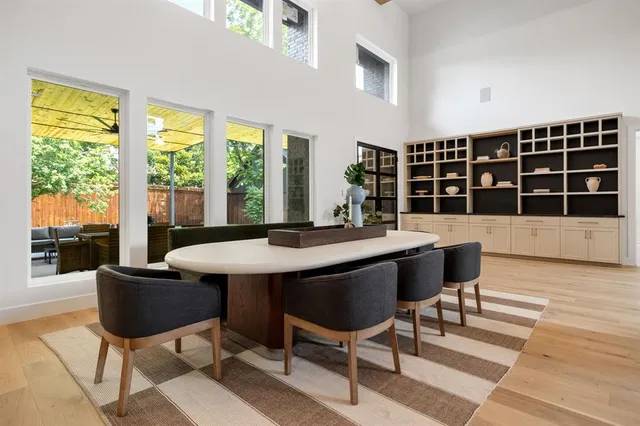 a view of a dining room with furniture window and outside view