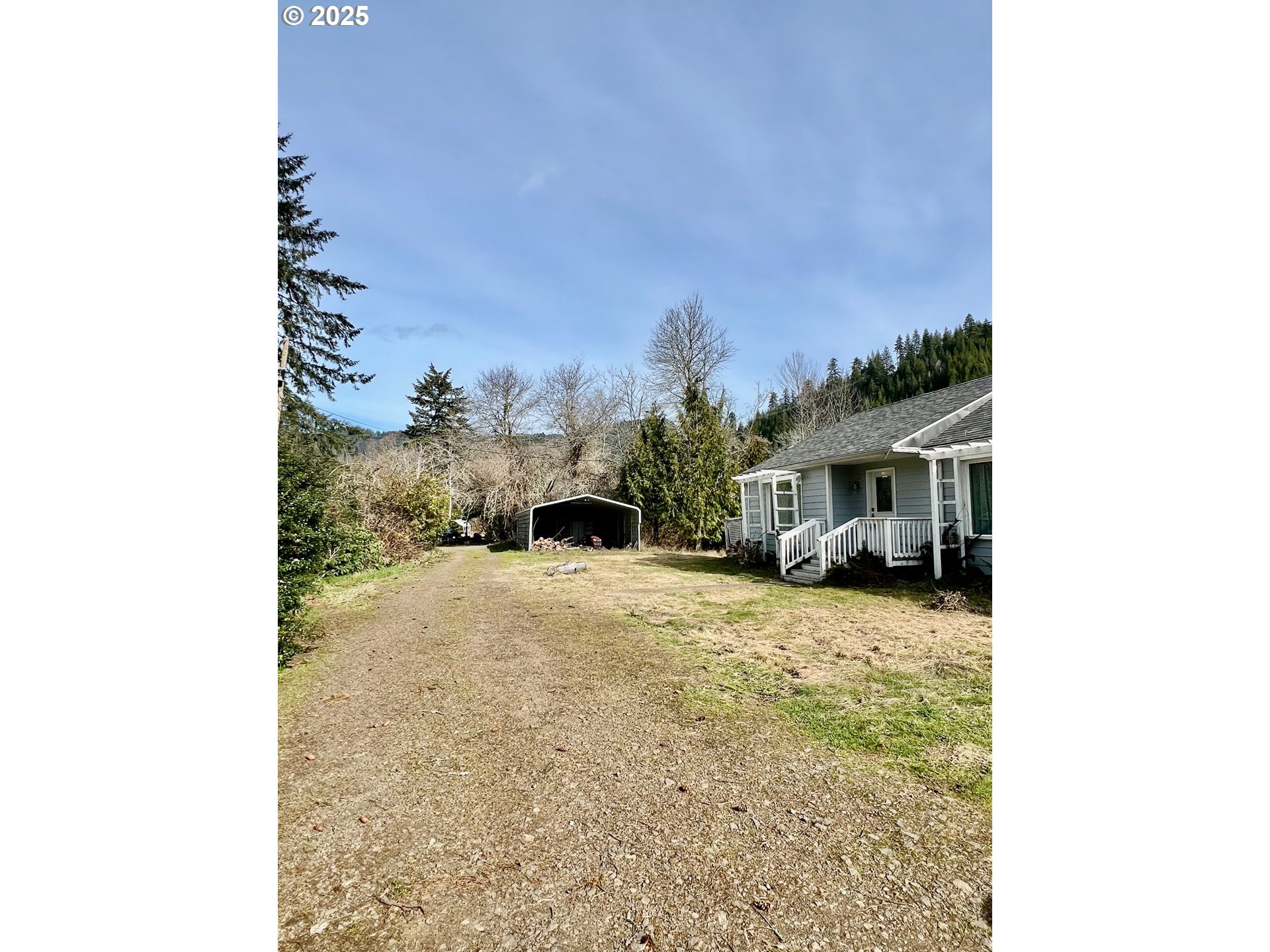 10742 Highway 126 Mapleton, OR 97453 - Photo 12 of 30 a spacious bathroom with a sink and a mirror