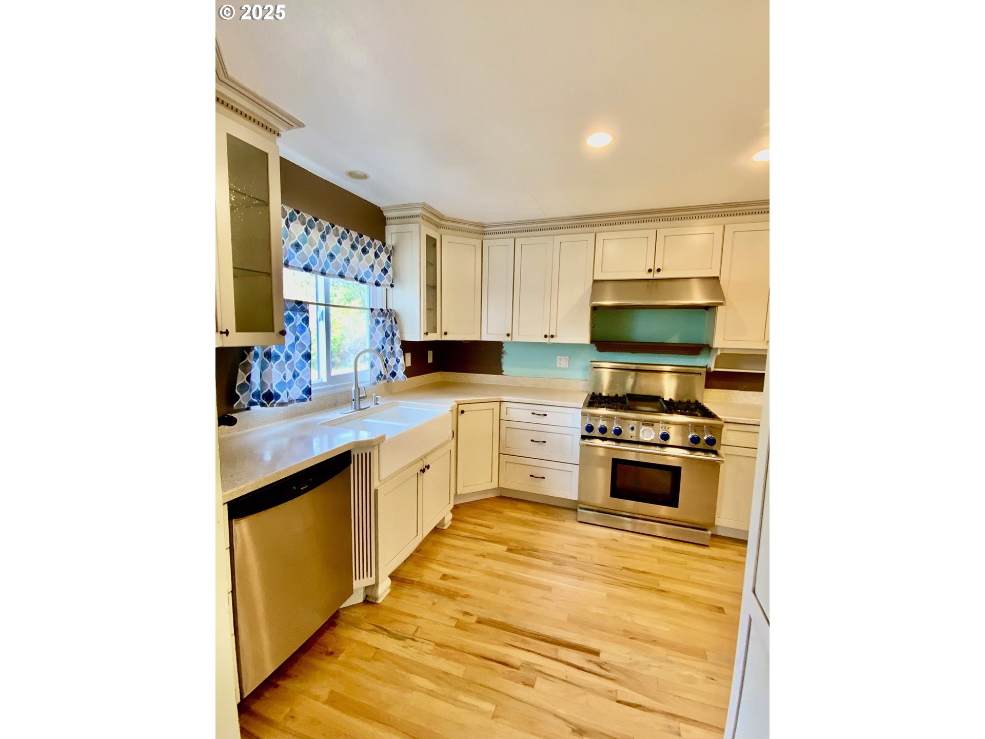 10742 Highway 126 Mapleton, OR 97453 - Photo 25 of 30 a kitchen with stainless steel appliances granite countertop a sink and cabinets