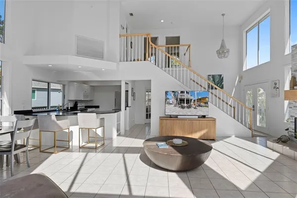 a living room with furniture and a table