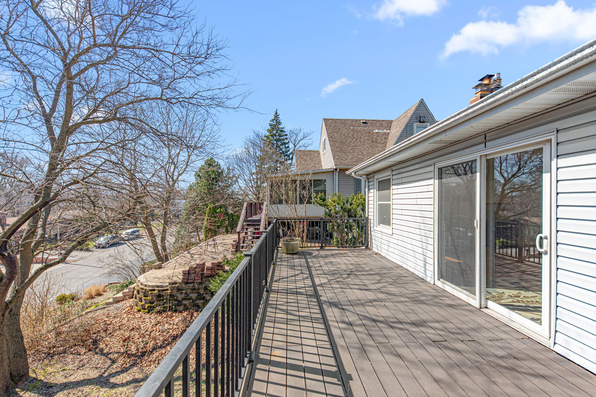 8632 Oak Avenue Gary, IN 46403 - Photo 19 of 34 a view of a roof deck with wooden floor and fence