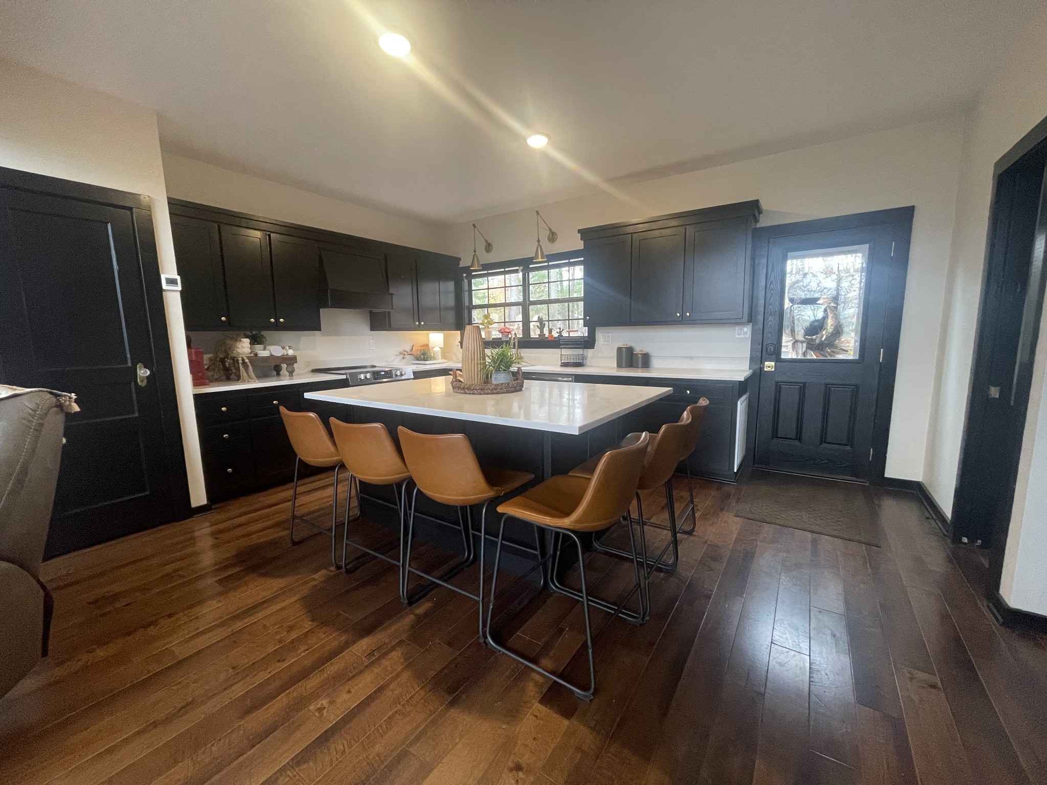 2029 Holly Creek Road Celina, TN 38551 - Photo 8 of 39 a dining hall with stainless steel appliances granite countertop a kitchen island hardwood floor and a sink