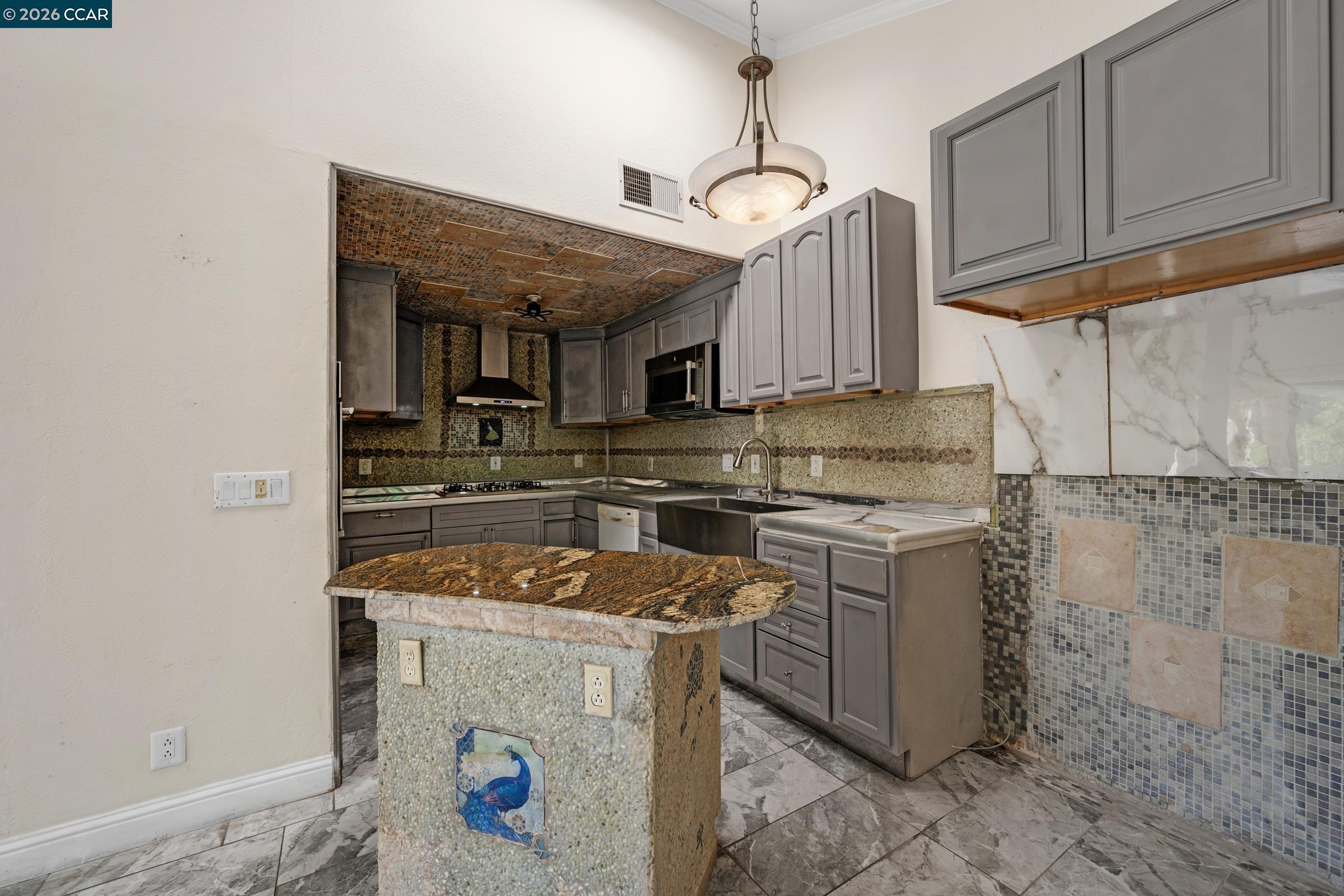 1544 Bailey Road, Unit 30 Concord, CA 94521 - Photo 9 of 33 a kitchen with a sink stove and cabinets