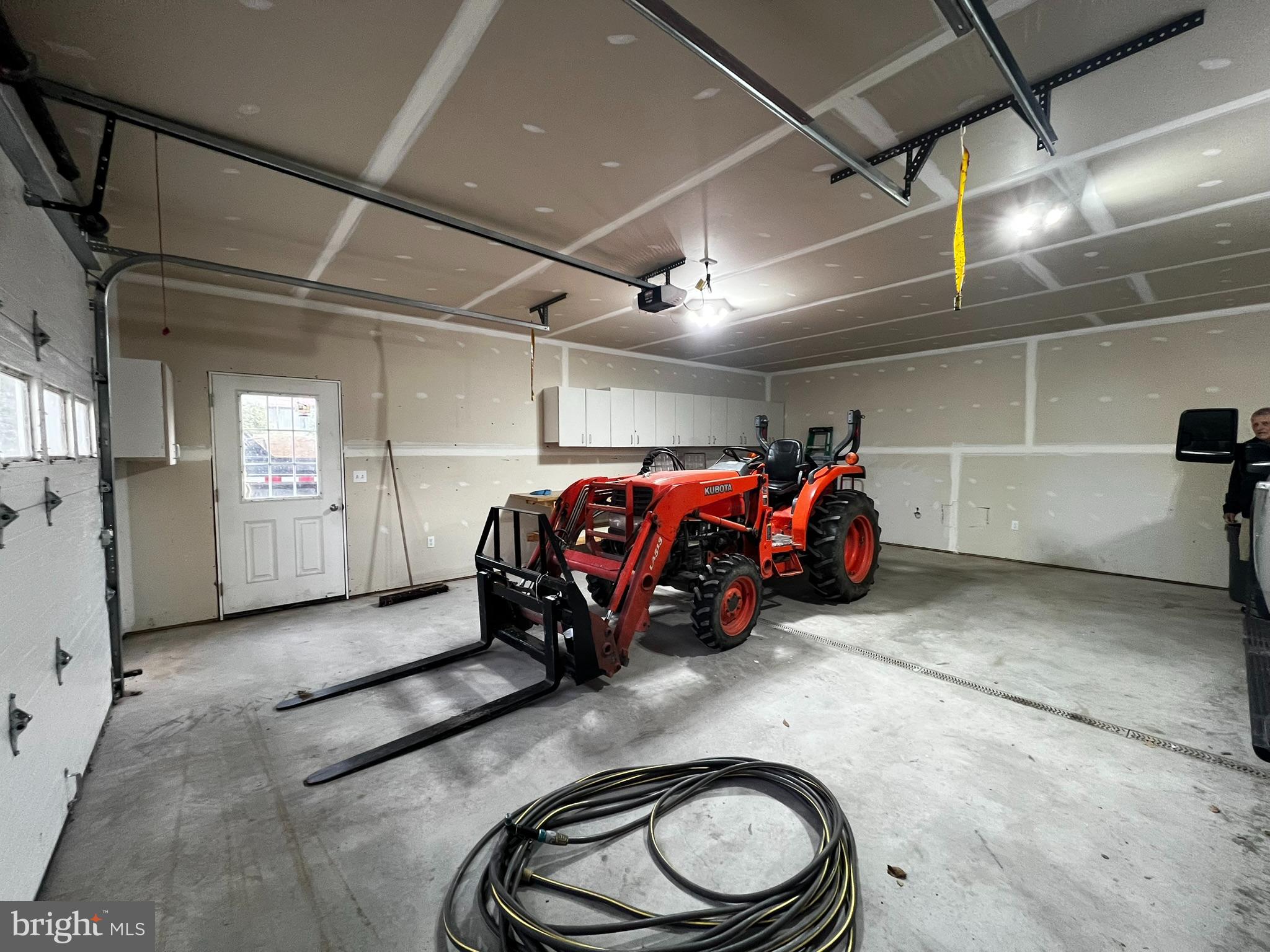 8690 Highway 25 Spring Glen, PA 17978 - Photo 30 of 31 a car parked in parking room
