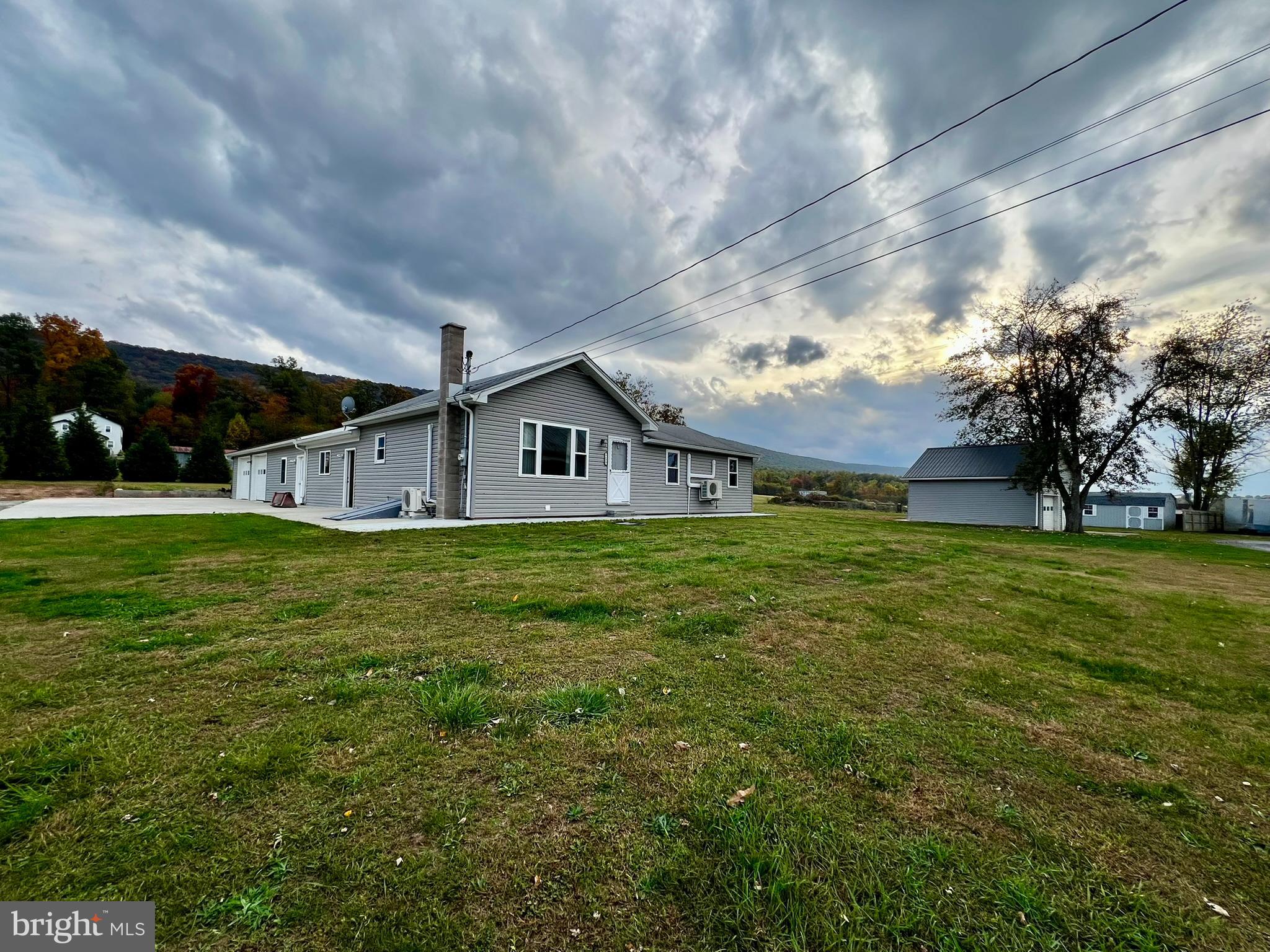 8690 Highway 25 Spring Glen, PA 17978 - Photo 3 of 31 a front view of house with garden