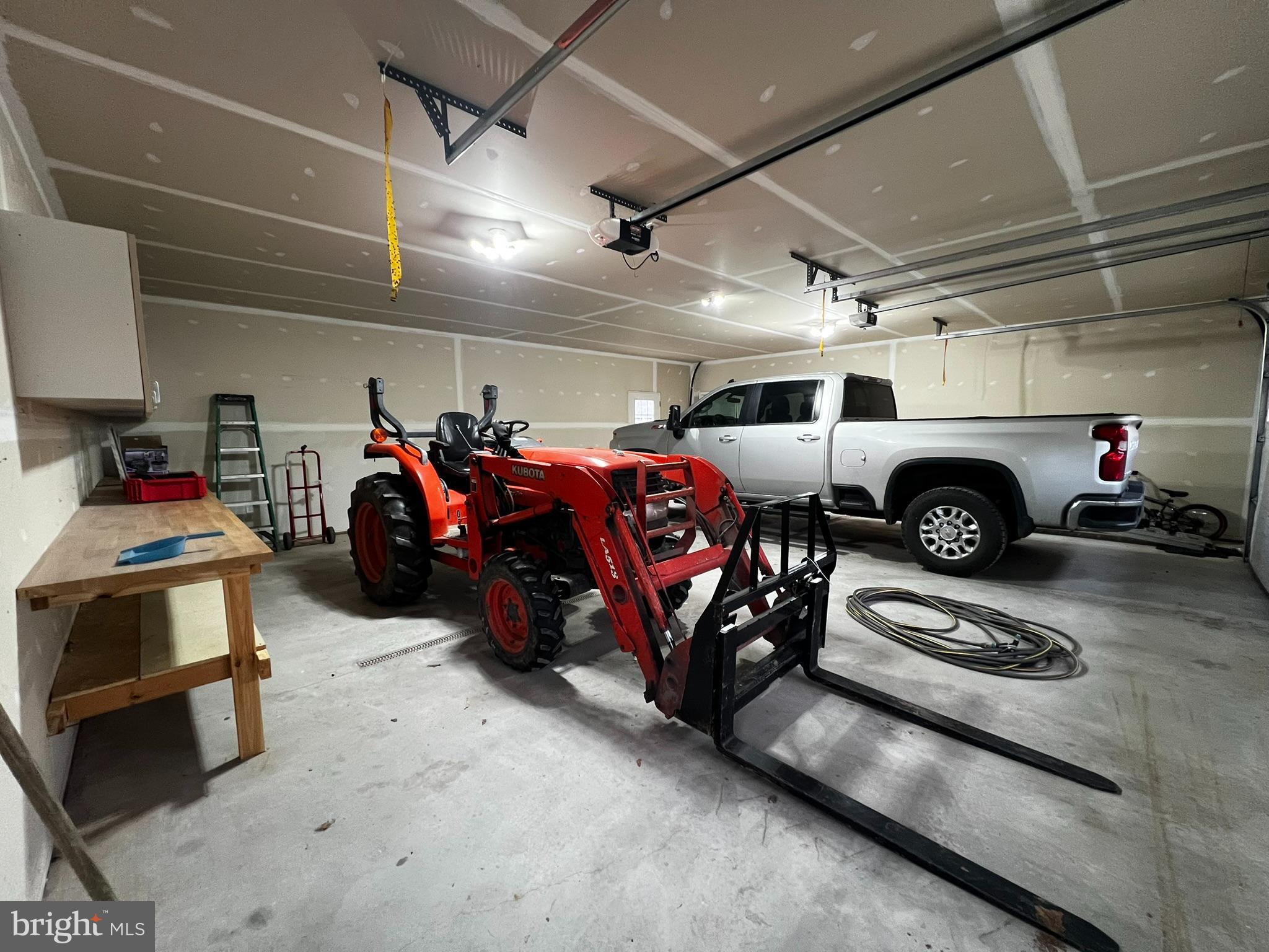 8690 Highway 25 Spring Glen, PA 17978 - Photo 31 of 31 a car parked in a garage