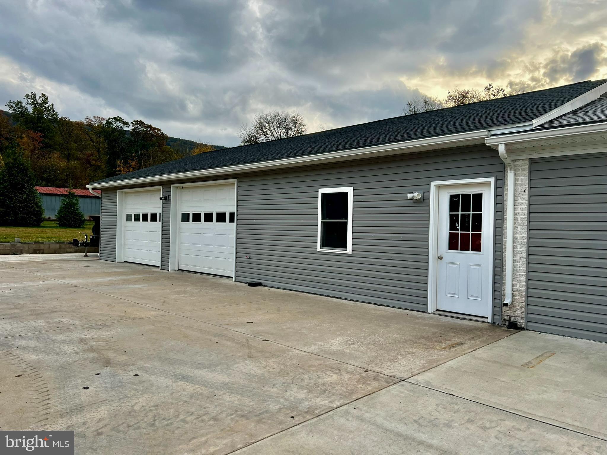 8690 Highway 25 Spring Glen, PA 17978 - Photo 6 of 31 a view of a house with a backyard