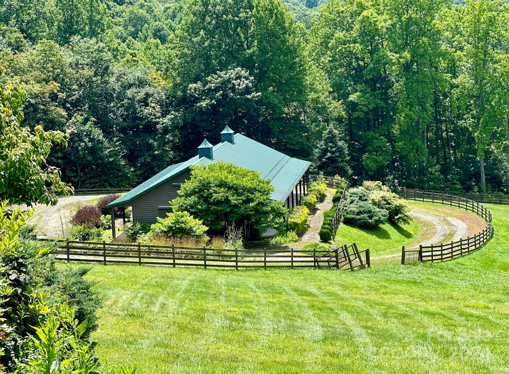 35 Flying Hawk Way Clyde, NC 28721 - Photo 18 of 22 a view of a swimming pool with a yard