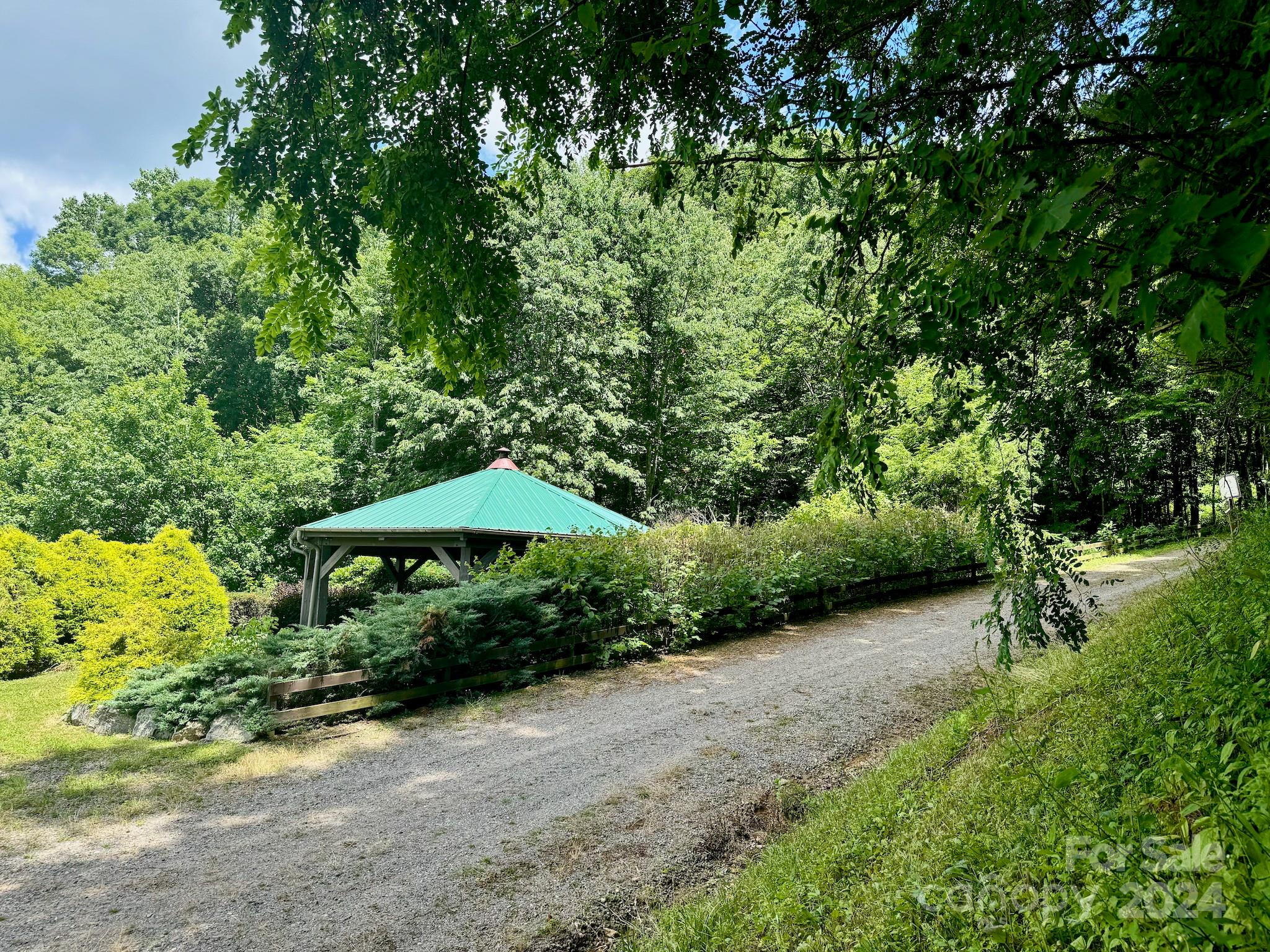 35 Flying Hawk Way Clyde, NC 28721 - Photo 9 of 22 a garden view with a seating space