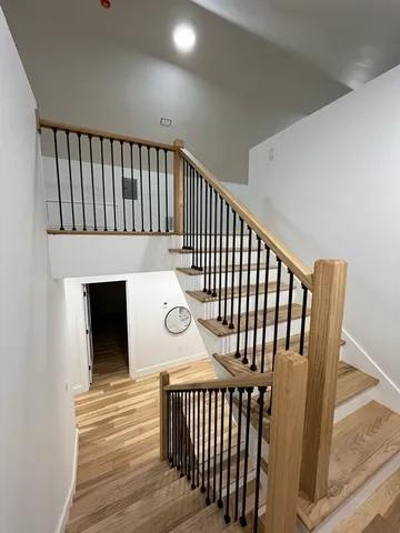 a view of entryway with wooden floor