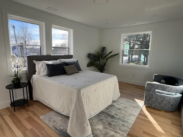 a picture of a cabinet with a white wall