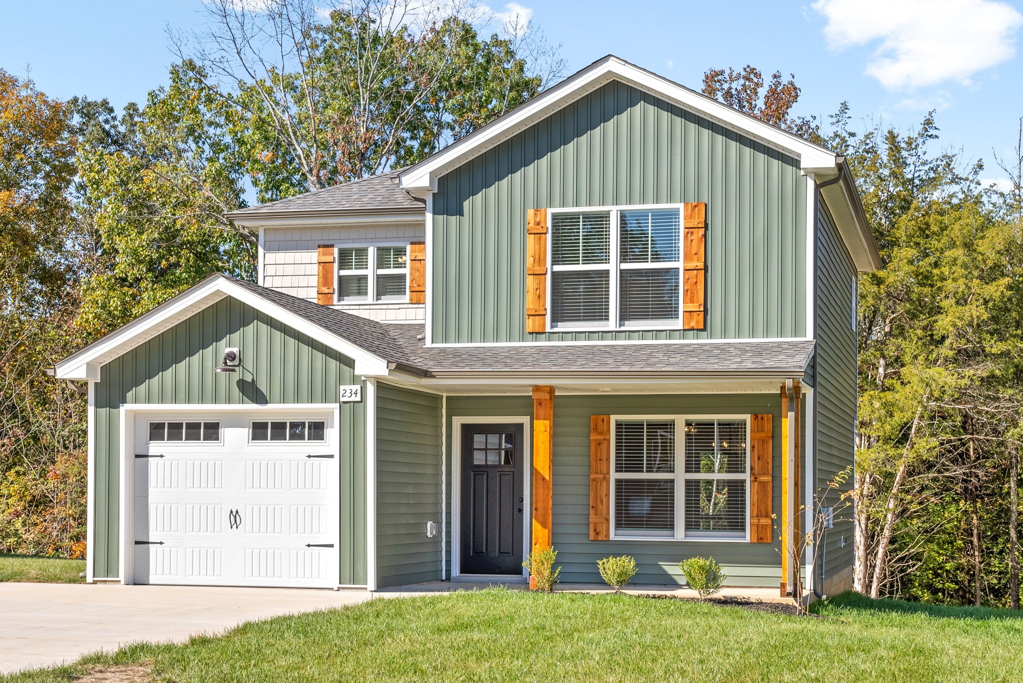 front view of a house with a yard